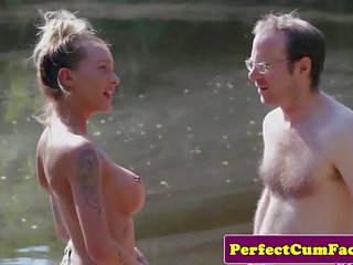 Busty femdom tugging adolescent outdoors for spunk