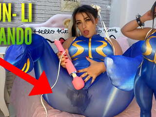 Enticing cosplay young female dressed as Chun Li from street fighter playing with her htachi vibrator cumming and soaking her panties and pants ahegao